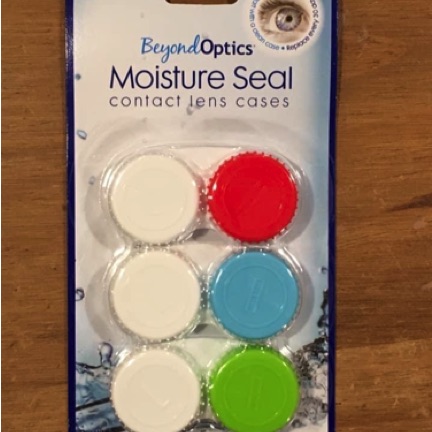 Contact lens cases used as battery caps and bridging teminals